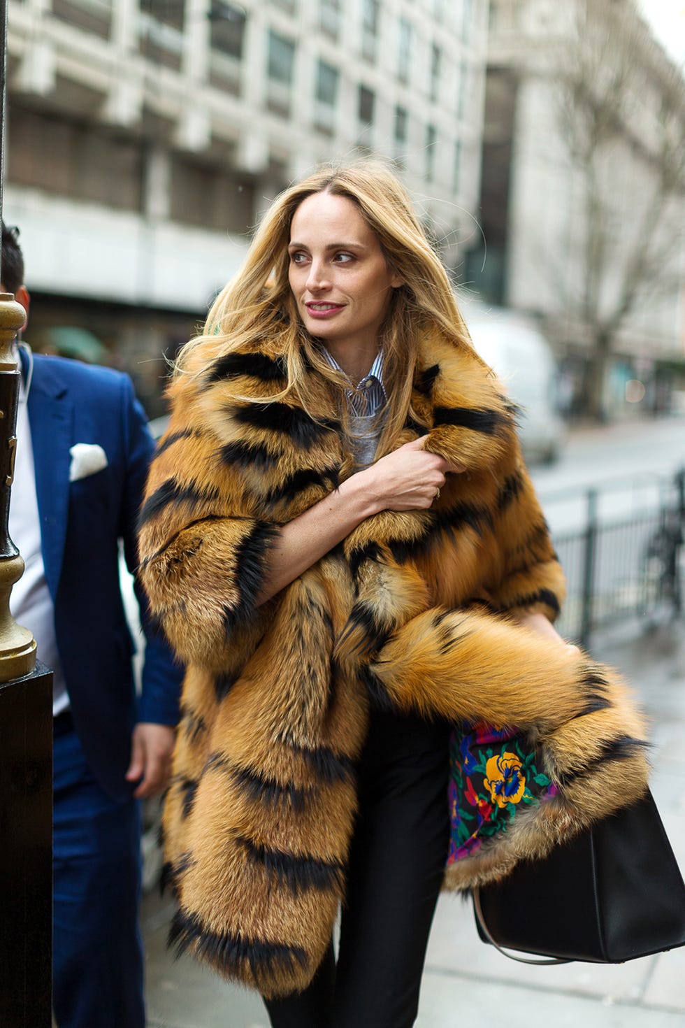 Human, Winter, Yellow, Fur clothing, Textile, Style, Natural material, Street fashion, Jacket, Animal product, 