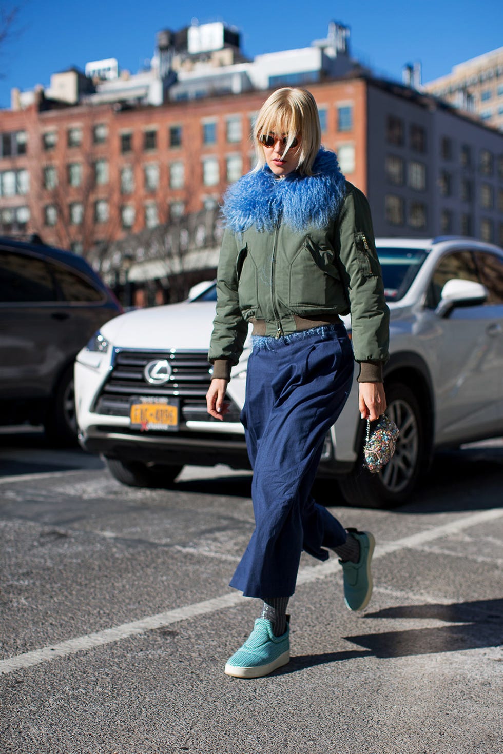 Clothing, Tire, Land vehicle, Vehicle, Trousers, Road, Car, Outerwear, Grille, Street, 
