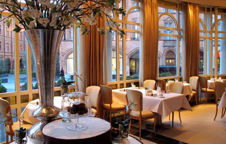 Furniture, Glass, Interior design, Table, Restaurant, Chair, Column, Interior design, Stemware, Drinkware, Furniture, Glass, Interior design, Table, Restaurant, Chair, Column, Interior design, Stemware, Drinkware,