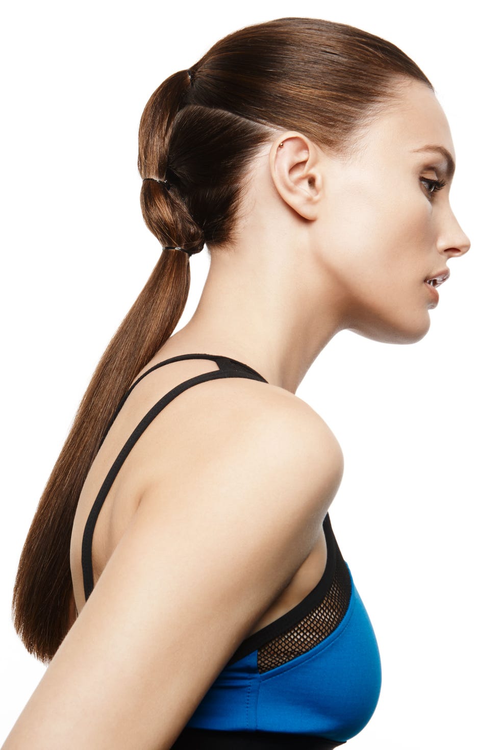<p>To create this segmented style, simply brush hair half-back and secure with a clear or hair-colored elastic. Then continue creating small sections underneath, incorporating the length of the ponytail into each hairband all the way down to the base of the neck. After your workout of choice, blow-dry or flat iron the length of the pony then set the look with <a href="http://bit.ly/1ScCKcK" target="_blank">Nexxus New York Salon Care Maxximum Finishing Mist</a> before jetting to dinner.<br>
</p><p><strong><br></strong>
</p><p><em><strong>Chromat</strong> Momentum Sports Bra, $165, </em><a href="http://chromat.co/collections/sport/products/cortex-performance-mesh-bra-black" target="_blank"><em>chromat.co</em></a><br>
</p><p><a href="http://chromat.co/collections/sport/products/cortex-performance-mesh-bra-black" target="_blank"></a></p>