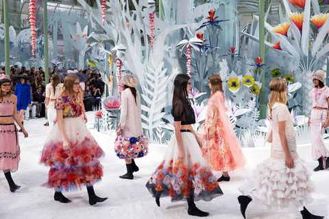 <p>Finding it hard to get into the spirit of Spring? Watch Chanel's spring/summer 2015 haute couture show on repeat and you'll want to stop and smell the flowers—and look fabulous while doing it. </p>