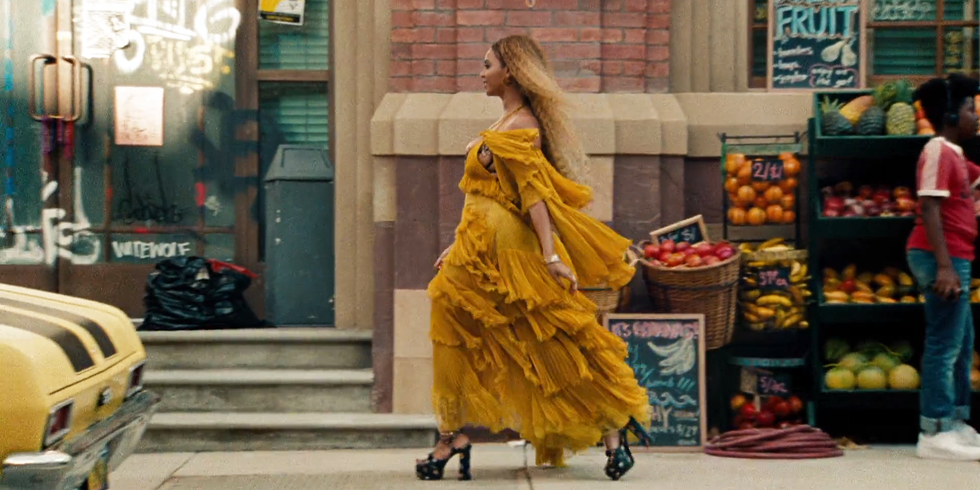 Street fashion, Produce, Fruit, Stairs, One-piece garment, Brick, Gown, Natural foods, Costume design, Baggage, 