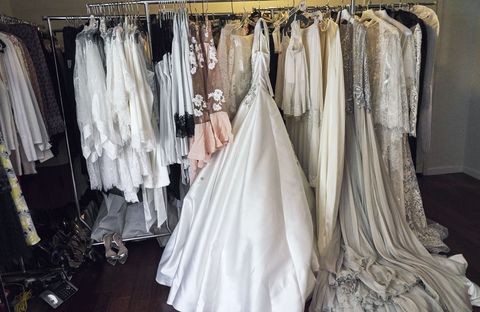 Textile, Floor, Clothes hanger, Grey, Wedding dress, Collection, Fashion design, Silver, Window treatment, Gown, 