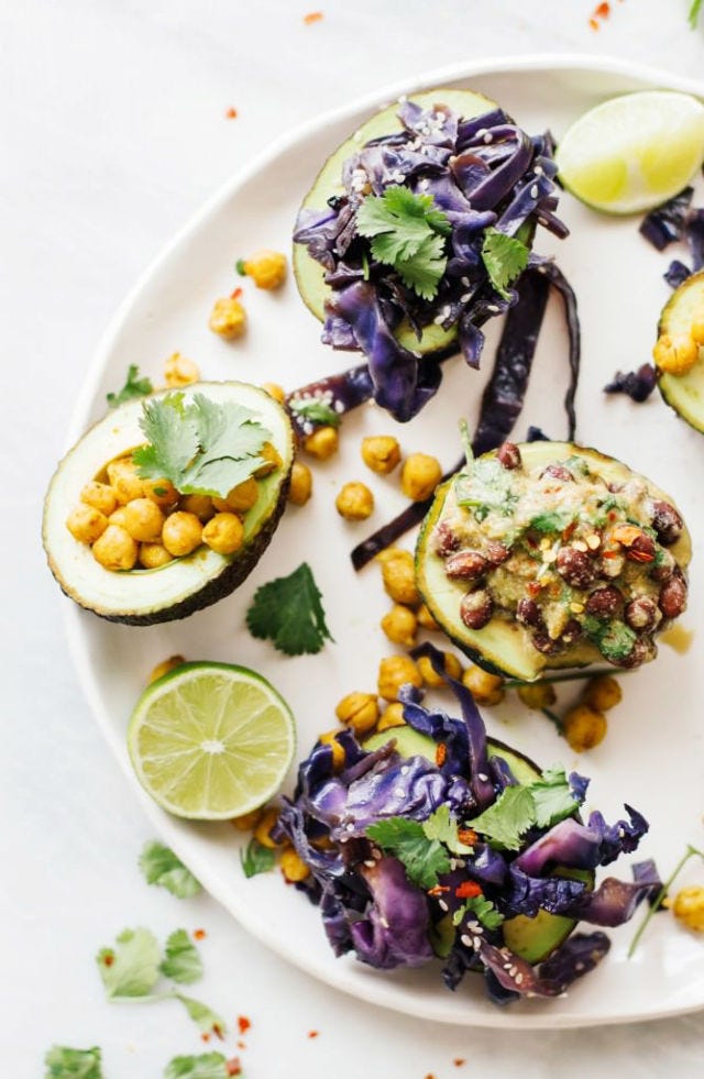<p><a href="http://nutritionstripped.com/best-avocado-boats-three-ways/" target="_blank">The Best Avocado Boats, Three Ways</a><br>
</p><p>By McKel Hill of <a href="http://nutritionstripped.com/blog" target="_blank">Nutrition Stripped</a>
</p><p>Prep time:  10 mins; Cook time:  10 mins; Total time:  20 mins<br>Serves: 1<br>
</p><p><strong>Ingredients: </strong>
</p><p><em>Sesame Cabbage</em>
</p><ul>
<li>½ head of red cabbage</li>
<li>2 tablespoons sesame seeds</li>
<li>2 tablespoons olive oil</li>
<li>2 tablespoons Nama shoyu sauce</li>
</ul><p><em>Spicy Black Bean</em>
</p><ul>
<li>2 cups black beans</li>
<li>¼ cup organic salsa of your choice</li>
<li>2 teaspoons red chili flakes</li>
<li>2 teaspoons ground cumin</li>
<li>2 tablespoons coconut oil (or olive oil)</li>
<li>½ teaspoon sea salt</li>
<li>Freshly ground black pepper</li>
<li>2 tablespoons nutritional yeast (optional)</li>
</ul><p><em>Curry Chickpea</em>
</p><ul>
<li>2 cups chickpeas</li>
<li>1 tablespoon curry seasoning blend</li>
<li>2 tablespoons coconut oil (or olive oil)</li>
<li>1 tablespoon maple syrup</li>
<li>½ teaspoon sea salt</li>
<li>Freshly ground black pepper</li>
<li>Garnish options for all avocado boats: fresh herbs like cilantro, chive, or parsley. Fresh lime juice.</li>
</ul><p><strong>Directions:</strong>
</p><ul>
<li>Sesame Cabbage: Add all cabbage ingredients into a medium-hot skillet and cook until tender and soft, about 10 minutes. Adjust seasonings to taste</li>
<li>Spicy Black Bean: Add all black bean ingredients into a medium-hot skillet and cook until warm. Adjust seasonings to taste</li>
<li>Curry Chickpea: Add all chickpea ingredients into a medium-hot skillet and cook until the chickpeas skin is firm and slightly crisp. Adjust seasonings to taste</li>
<li>To assemble, halve each avocado (1 avocado per serving), remove pit, gently remove avocado flesh from the skin and place in a small mixing bowl. Combine the avocado flesh with ⅓ cup of whichever filling you'd like to use and stir to combine. Use this filling to fill the avocado skin. Serve immediately. Only store leftover fillings in an airtight glass container, open avocados only when you're immediately serving.</li>
</ul><p>Notes: Each filling will make about 4 total servings (i.e. 4 whole avocados), store leftovers in an airtight glass container for later.</p>