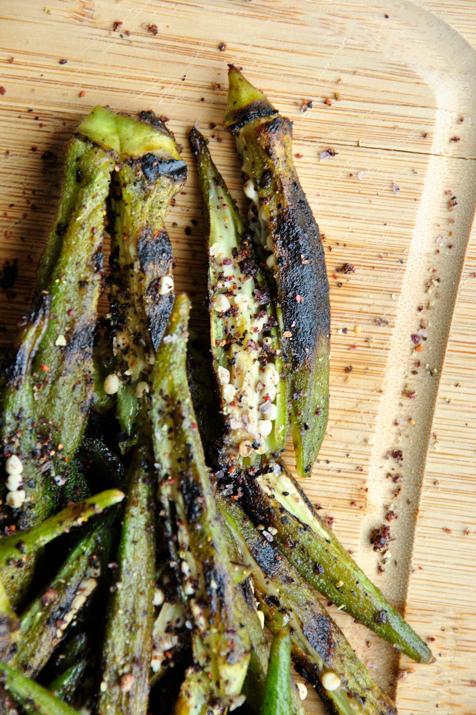 <p><a href="http://blog.sanuraweathers.com/2015/04/whats-not-to-like-about-okra/" target="_blank">Blueberry-Coffee Spice Grilled Okra</a> </p><p>By Sanura Weathers of <a href="http://blog.sanuraweathers.com/" target="_blank">My Life Runs on Food</a><br></p><p><strong>Ingredients: <br></strong></p><ul>
<li>1 lb. fresh okra pods, gently scrubbed cleaned</li>
<li>4 tbsp. of peanut or neutral oil</li>
<li>About ¼ cup Blueberry-Coffee Spice Rub (or use blackened seasoning), plus more for garnish</li>
<li>A pinch of sea salt, to taste</li>
<li>A pinch of fresh black pepper, to taste</li>
</ul><p><strong>Directions:</strong></p><ul>
<li>Fill a medium pot with salted water and bring to a boil. Add okra pods to blanch for about one minute. Quickly remove from pot. Rinse with cold water and strain excess water.</li>
<li>In a large bowl, toss blanched okra with two tablespoons of oil, Blueberry-Coffee Spice Rub, salt and black pepper.</li>
<li>Meanwhile, prepare an outdoor or indoor grill. If using indoor grill, heat over medium-high heat.</li>
<li>When the grill pan is hot, add the last two tablespoons of oil. After a few seconds, add the seasoned okra pods. Grill for about three minutes per side. Remove onto a paper-towel lined plate.</li>
<li>Vertically slice each grilled okra pod. Garnish with a little sprinkling of Blueberry-Coffee Spice Rub.</li>
<li>Enjoy.</li>
</ul>