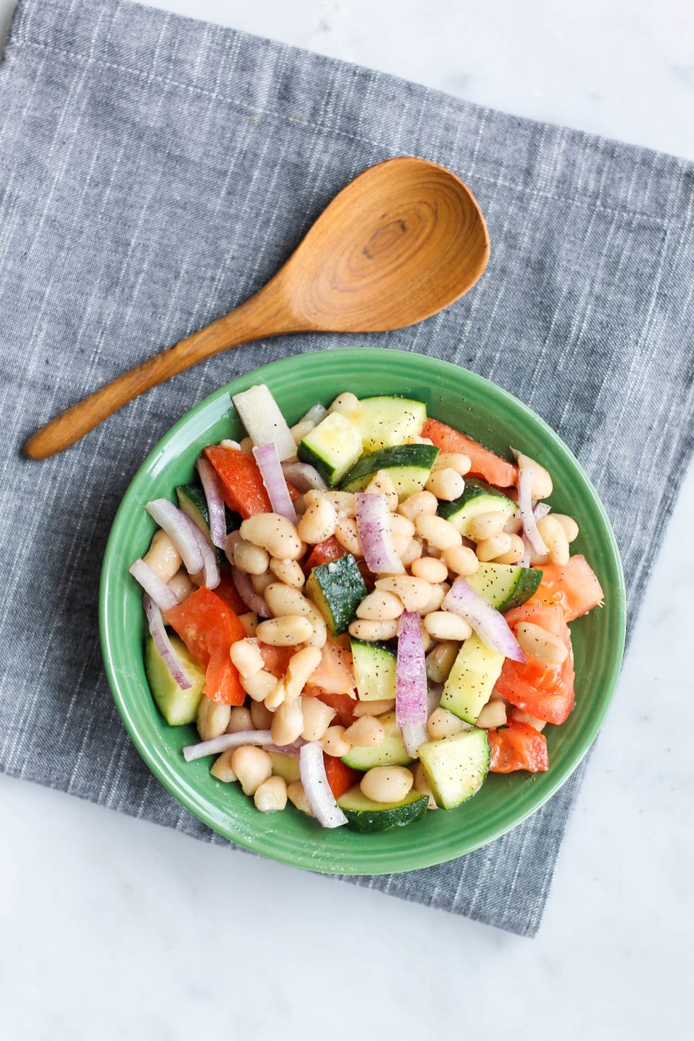 <p><a href="https://pulsepledge.com/recipe/white-bean-salad/" target="_blank">White Bean Salad</a>
</p><p>By <a href="https://pulsepledge.com/" target="_blank">PulsePledge.com</a>
</p><p>Prep time: 5 mins. Cook time: 5 mins.
</p><p>Serves 4
</p><p><strong>Ingredients:</strong></p><ul>
<li>1 cucumber</li>
<li>2 tomatoes</li>
<li>½ red onion</li>
<li>1 can white beans, drained and rinsed</li>
<li>2 tbsp olive oil</li>
<li>Salt and pepper</li>
</ul><p><strong>Directions:</strong>
</p><ul>
<li>Chop the cucumber, and tomato into ½ inch pieces and dice the red onion. Combine in a large bowl.</li>
<li>Add the drained beans the the bowl, then drizzle the olive oil over top. Toss gently to combine.</li>
<li>Season with salt and pepper to taste</li>
</ul>