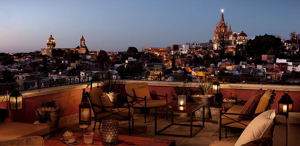 Furniture, City, Metropolitan area, Roof, Tower, Flowerpot, Skyline, Couch, Metropolis, Finial, 