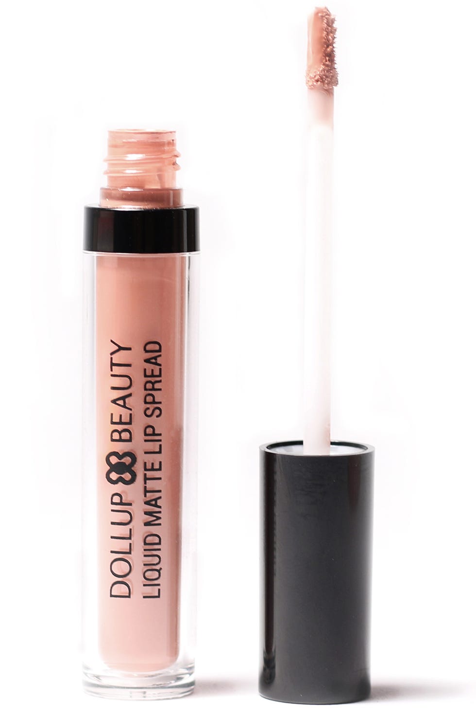 <p>"I rarely wear anything other than a red lip, but when the occasion calls for a simple nude, this lip spread is perfect. It goes on wet but immediately dries to matte perfection—their red shade (102) is another go-to."</p><p><strong>Dollup Beauty</strong> Matte Lip Spread in 105, $19, <a href="http://dollupbeauty.com/products/matte-lip-spread" target="_blank">dollupbeauty.com</a>.</p>