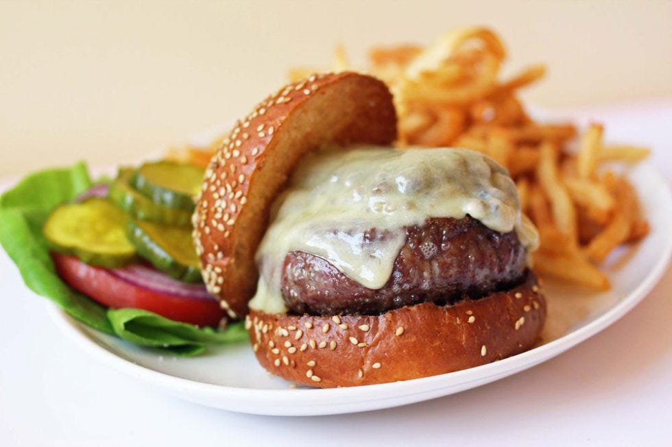 <p>Keith McNally, responsible for other top-tier burger establishments like Minetta Tavern and <a href="http://www.theodeonrestaurant.com/" target="_blank">Odeon</a>, opened this charming French eatery and obviously couldn't resist topping off the menu with not one, but two killer burgers. The restaurant's namesake burger boasts a more untraditional set of top-offs: bacon marmalade, roasted mushrooms and aged Gruyère. You may find yourself doing a double take when deciding between this dish and the Black Label Burger, which McNally rolled over from Minetta Tavern due to it's popularity. Both are served with pommes frites and are best enjoyed at the eatery's enchanting bar with a well-done martini.</p><p><em><a href="http://www.cherchemidiny.com/" target="_blank">Cherche Midi, 282 Bowery</a></em></p>