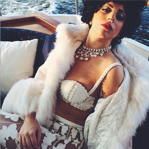 <p>Lady Gaga demonstrates how to upgrade a septum piercing for a luxe day lounging on your yacht. </p>