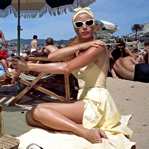 Cat-eye sunglasses + a scarf tied as a headband = the perfect accessory equation for a beach moment on level with Grace Kelly in To Catch A Thief.
