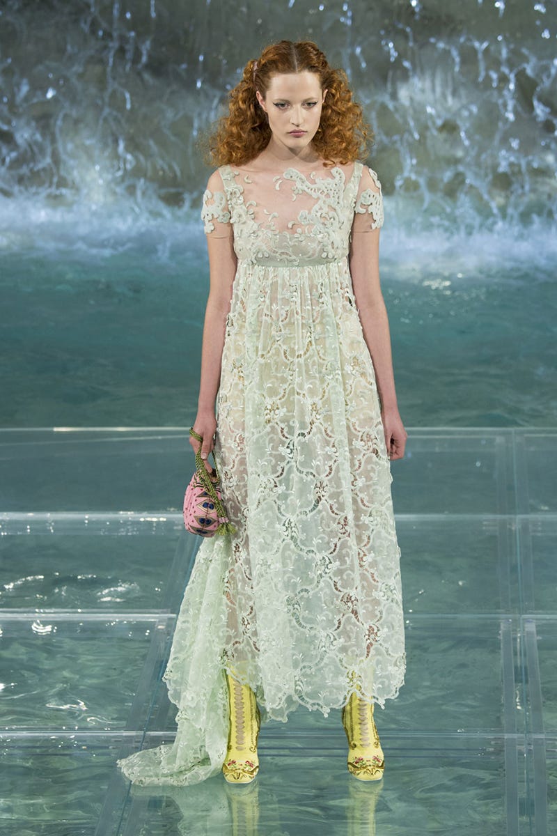 Clothing, Dress, Hairstyle, Green, Formal wear, One-piece garment, Aqua, Beauty, Water feature, Waist, 