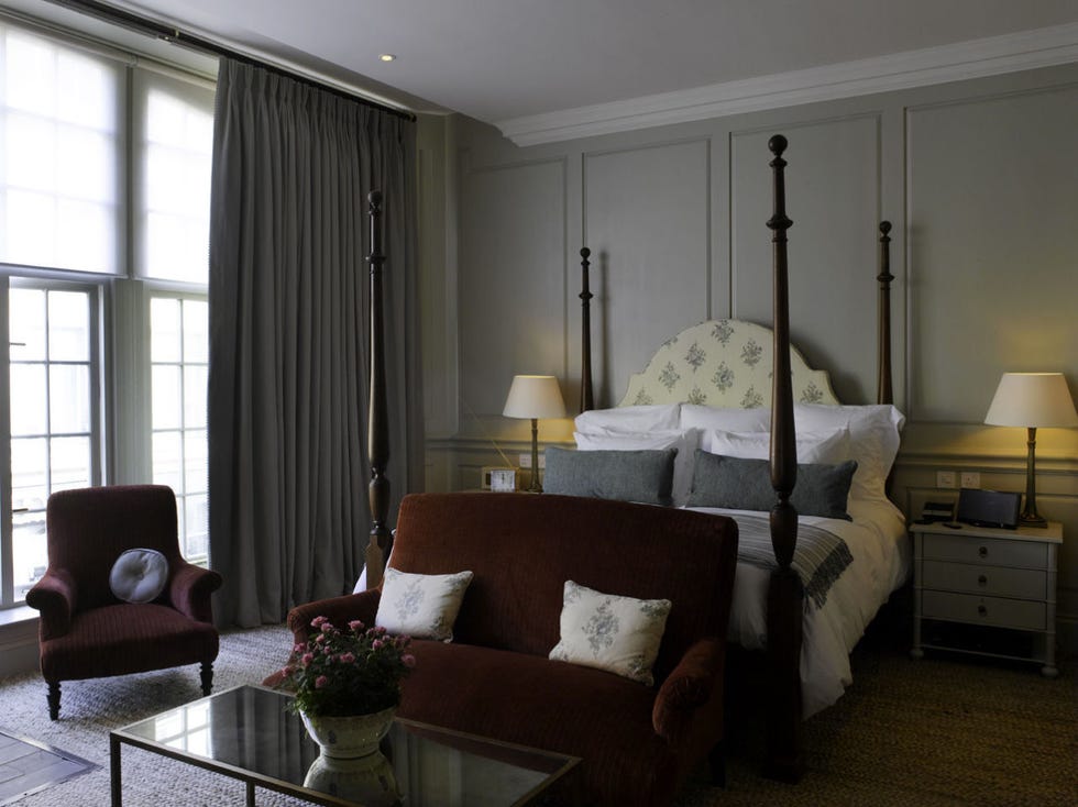 <p>A branch of the members-only Soho House, which originated in London and has made its way worldwide, <a href="http://www.deanstreettownhouse.com/hotel" target="_blank">Dean Street Townhouse</a> is a 39-bedroom hotel located in two Georgian-style residences in Soho. Dean Street is only one of Soho House's <a href="https://www.sohohouse.com/houses" target="_blank">multiple properties</a> in the UK–Little House in Mayfair, Shoreditch House, the Electric House on Portobello Road, a West London property and two countryside properties are also available to members. With rooms ranging from tiny to Bigger, this property caters to cosmopolitan travelers looking for a downtown feel, those who prefer a chic place to hang out over a marble lobby, white glove service and a prim and proper afternoon tea (they have one here, but it's just inherently cooler than a Mayfair tea service). Walking in to this unassuming residence is will initially make you feel as though you're at a private party à la <em>Eyes Wide Shut</em>–a winding wooden staircase leads you down a creaky, dimly-lit corridor lined with tufted velvet furniture and couples cozied up in little nooks. Well-dressed groups of friends enjoying ever-flowing champagne in the many small seating areas leading into the restaurant and bar make for a cool vibe (and set the tone that the party isn't ending anytime soon). Drinks at the <a href="http://www.deanstreettownhouse.com/restaurant" target="_blank">hotel's restaurant</a> (which serves classic British food at all hours) and bar are strong and well-made, and the ambiance is as well–you'll likely catch a few designers, models, It-girls and musicians sipping their drinks of choice after hours. </p><p><br></p><p><em><a href="http://www.deanstreettownhouse.com/contact" target="_blank">Dean Street Townhouse</a>; 69-71 Dean Street,  W1D 3SE, +44 0207 434 1775.</em></p>