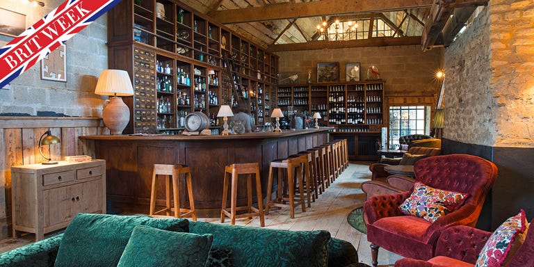 Wood, Room, Furniture, Barware, Living room, Interior design, Hardwood, Logo, Cabinetry, Wood stain, 