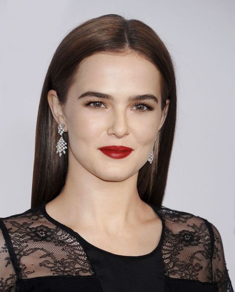<p>"I think the Hepburn lip is about looking amazing but approachable," says celebrity makeup artist <a href="https://www.instagram.com/andremakeup/?hl=en" target="_blank">Andre Sarmiento</a> who did Zoey's look here. "It's not the the sharp matte statement lip of seasons past. It's perfect but soft; rich but accessible. There's depth to the color and the texture is more satin. That's what makes it more modern for today."</p>