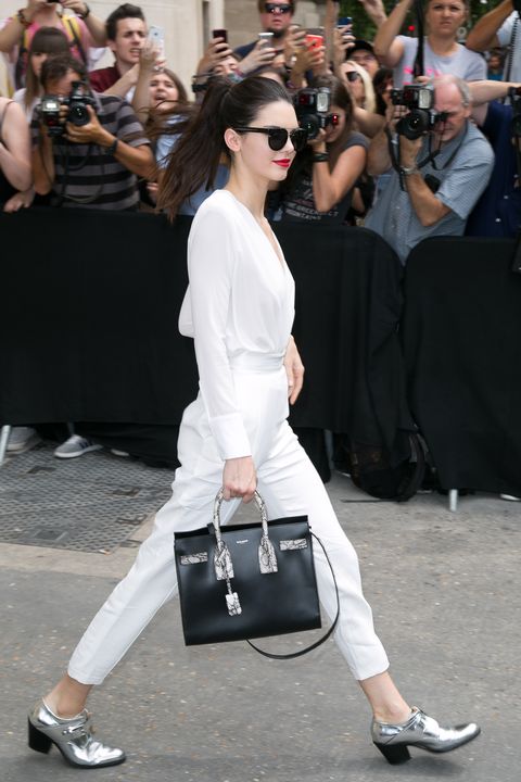 <p>Kendall Jenner is beloved for her polished take on off-duty style, and you're just as likely to spot her in a sleek jumpsuit as jeans and a t-shirt. </p><p><strong data-redactor-tag="strong">Go-to look: </strong>Jeans, booties, and a comfortable t-shirt.</p><p><strong data-redactor-tag="strong">Her style in two words:</strong> " Comfortably tailored."</p><p><br></p>