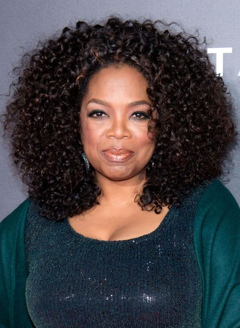 <p>Oprah ages backwards thanks to her iconic curls and subtle face-framing layers.</p>