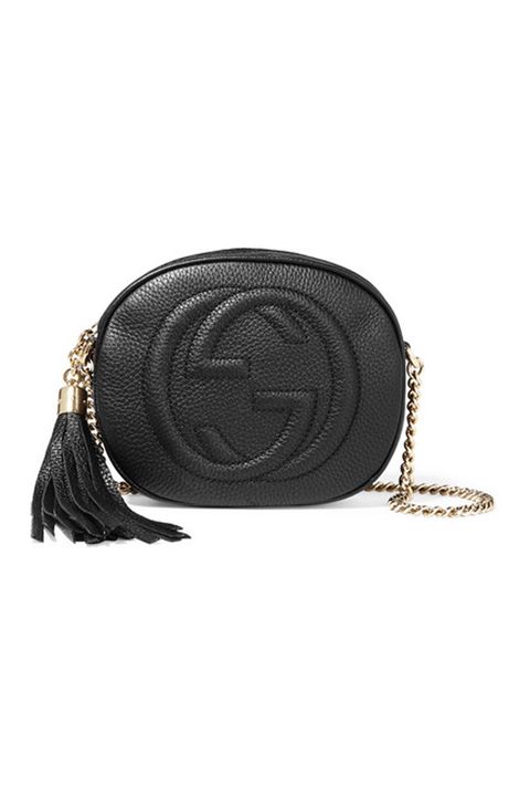 <p>"<em data-redactor-tag="em">What girl doesn't love bags?</em> I can pack a lot of mini bags in my suitcase since they take up less space. My go-tos: Chloe, Rebecca Minkoff and Gucci."</p><p>Gucci Soho Mini Textured-Leather Shoulder Bag, $850, <a href="https://www.net-a-porter.com/us/en/product/685176?cm_mmc=ProductSearchPLA-_-US-_-Bags-_-ShoulderBags-Google&amp;gclid=CPTwvPKry84CFY5Zhgodwr4AkQ" target="_blank">net-a-porter.com</a></p>