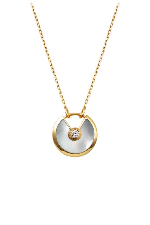 <p>"I really love dainty jewelry like rings and necklaces that I can layer in different ways to finish a look. I always have at least one necklace on (right now, it's the Cartier Amulette), but I also like mixing it with more affordable options like pieces from Anarchy Street."</p><p>Cartier Amulette Necklace, $1890,<a href="http://www.cartier.us/en-us/collections/jewelry/collections/amulette-de-cartier/amulette-de-cartier-necklaces/b3047100-amulette-de-cartier-necklace.html" target="_blank">cartier.com</a></p>