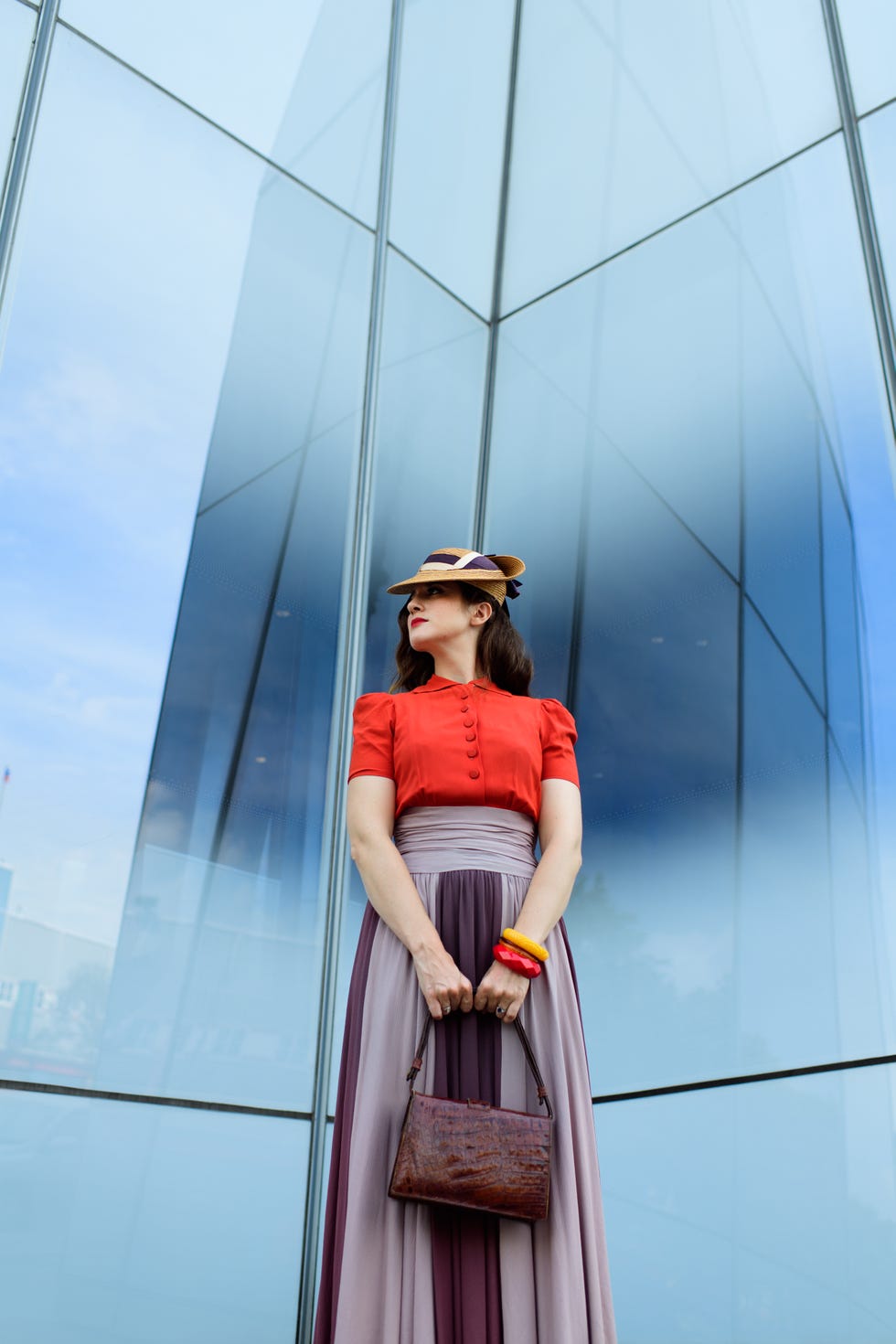 Hat, Dress, Electric blue, Waist, Costume, One-piece garment, Lipstick, Gown, Transparent material, Model, 