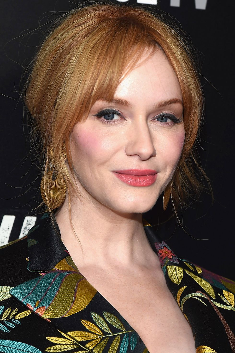 <p>Hendricks is one of the few with a fair complexion that can pull off deep crimson equally well as reddish blonde. Deeper roots and side swept bangs give this look a modern edge.<span class="redactor-invisible-space"></span></p>