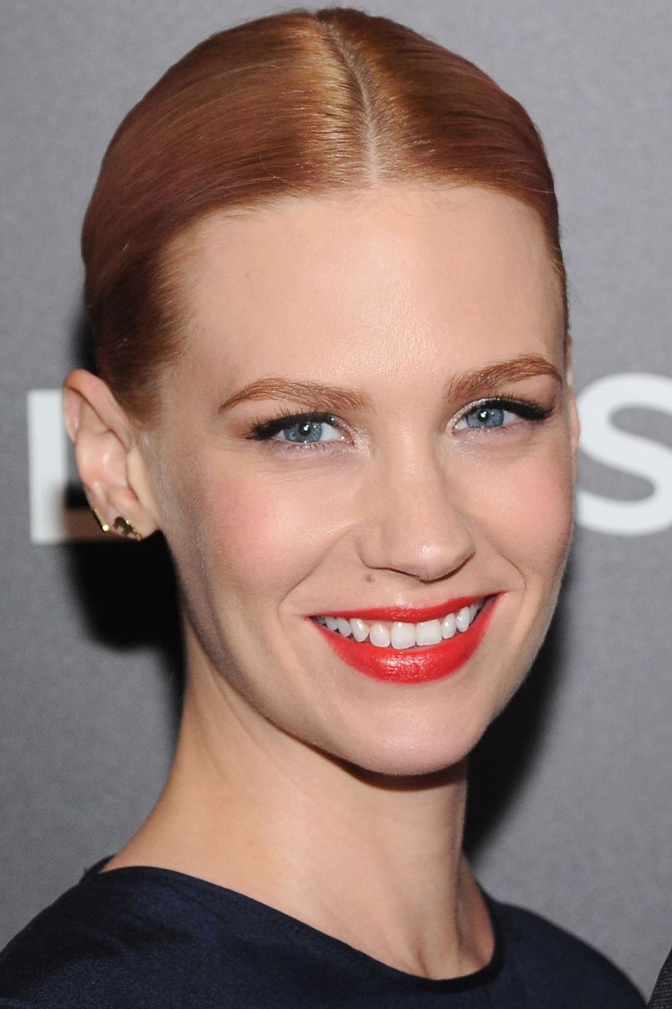 <p>A slightly pink-infused crown puts a punky spin on January Jones' red-blonde hybrid. &nbsp;<span class="redactor-invisible-space"></span></p>