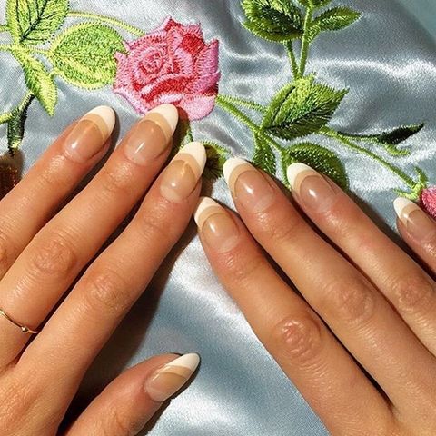 <p>This look, worn by ELLE.com's own beauty guru Julie Schott, is an subtle&nbsp;way to update the french manicure. After your white tips are dry, underline it was a stripe of nude&nbsp;and finish it off with a clear topcoat.&nbsp;</p><p><em data-verified="redactor" data-redactor-tag="em"><a href="https://www.instagram.com/p/BDI2qt8E93Q/" target="_blank">@naominailsnyc</a></em></p>