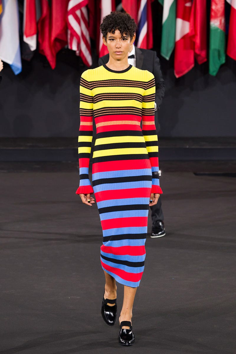 Sleeve, Textile, Red, Joint, Style, Street fashion, Fashion, Fashion show, Fashion model, Flag, 