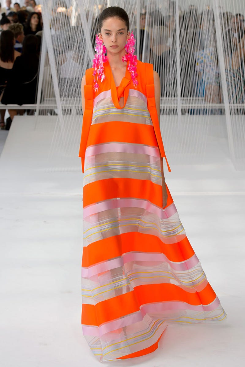 Orange, Textile, Fashion show, Style, Dress, Fashion model, Street fashion, Fashion, One-piece garment, Pattern, 