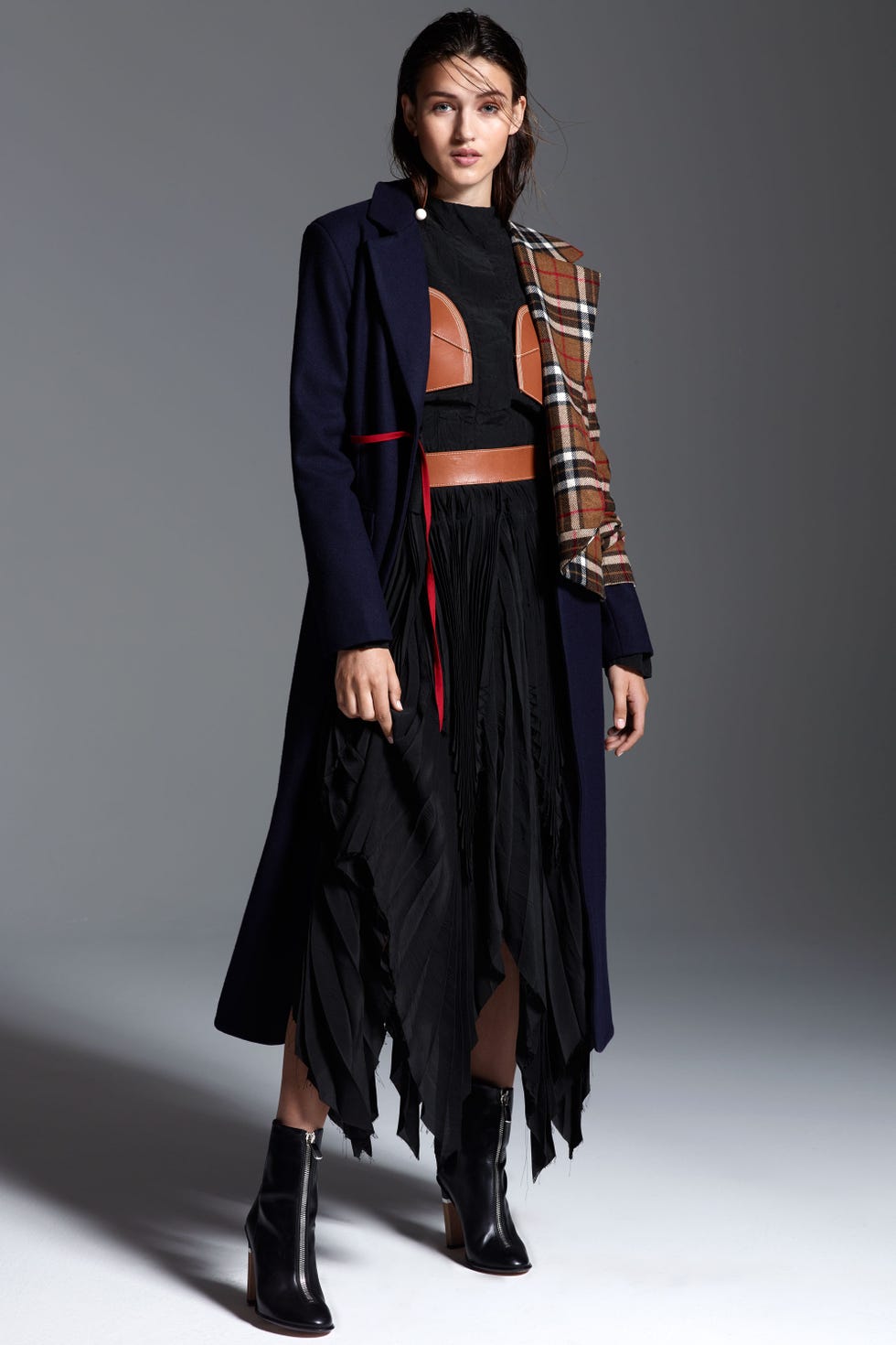 <p>Deconstruction and reconstruction are major themes in fashion for fall. Nail the look with a patchwork coat—<span class="redactor-invisible-space" data-verified="redactor" data-redactor-tag="span" data-redactor-class="redactor-invisible-space"></span>complete with an craftsy-chic outfit underneath.&nbsp;<span class="redactor-invisible-space" data-verified="redactor" data-redactor-tag="span" data-redactor-class="redactor-invisible-space"></span></p><p><em data-redactor-tag="em" data-verified="redactor"><strong data-redactor-tag="strong" data-verified="redactor">Jacquemus</strong> 'Le Manteau Vest' Long Wool Coat, $1,190, <a href="http://shop.nordstrom.com/s/jacquemus-le-manteau-vest-long-wool-coat/4336665?&amp;cm_mmc=Mindshare_Nordstrom-_-WAP_October-_-Hearst-_-proactive" target="_blank">nordstrom.com</a>; <strong data-redactor-tag="strong" data-verified="redactor">Loewe</strong> Top and&nbsp;Pleated Midi Skirt, for similar styles visit <a href="http://shop.nordstrom.com/c/loewe?origin=productBrandLink&amp;page=2&amp;top=66" target="_blank">nordstrom.com</a>; <strong data-redactor-tag="strong" data-verified="redactor">BOSS</strong>&nbsp;Zip Booties, $1,095,&nbsp;<a href="http://www.hugoboss.com/us/%27zip-bootie%27-italian-calfskin-zip-ankle-boot/hbna50326443.html?cgid=12001&amp;dwvar_hbna50326443_color=001_Black#start=1" target="_blank">hugoboss.com</a>; <strong data-redactor-tag="strong" data-verified="redactor">Stella McCartney</strong> Long Ball Detail Earring, $630, </em><a href="https://www.farfetch.com/shopping/women/Stella-McCartney-long-ball-detail-earrings-item-11664901.aspx?utm_source=gcdL/ATRVoE&amp;utm_medium=affiliate&amp;utm_campaign=Linkshareus&amp;utm_content=10&amp;utm_term=USNetwork" target="_blank"><em data-redactor-tag="em" data-verified="redactor">farfetch.com</em></a></p>