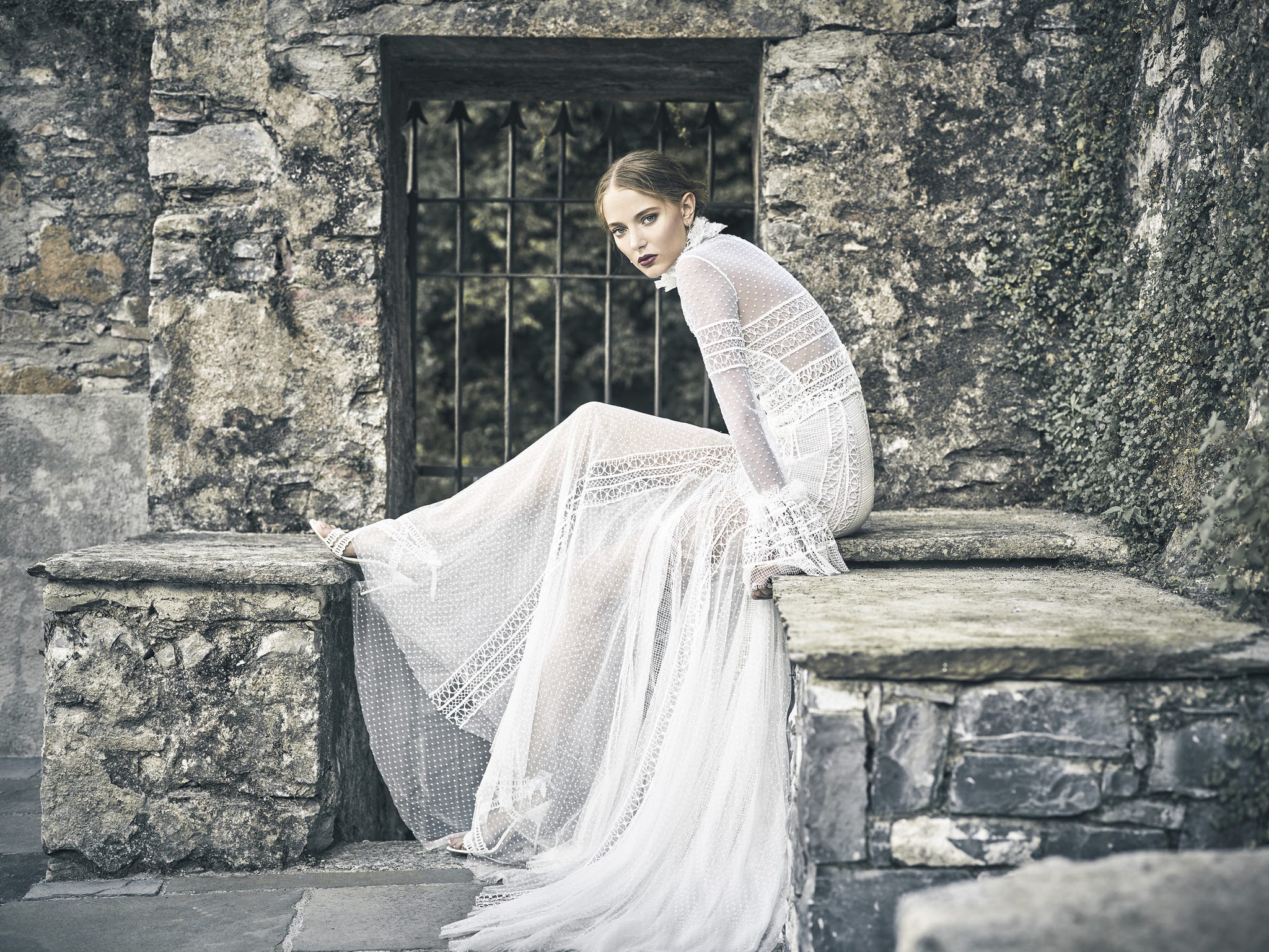 Sleeve, Dress, Wedding dress, Gown, Bridal clothing, Bride, Street fashion, Embellishment, Monochrome, Vintage clothing, 