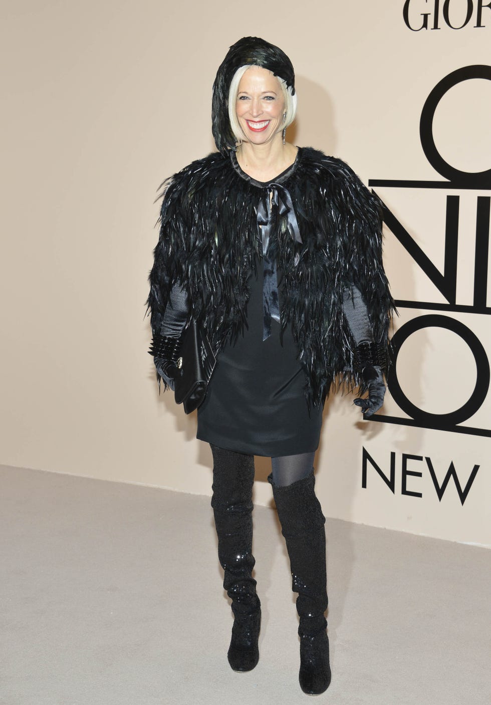 Human, Style, Costume accessory, Knee, Boot, Fashion, Fashion model, Black, Thigh, Fur, 
