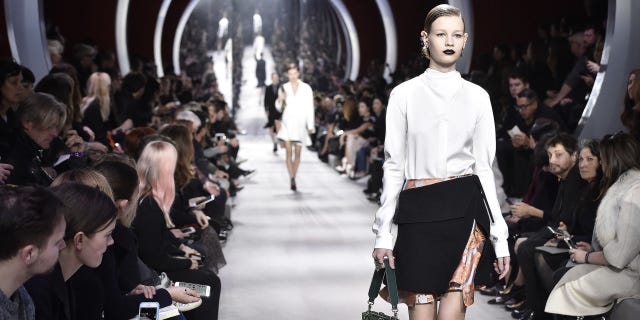 Face, Head, Leg, Human body, Fashion show, Outerwear, Style, Runway, Street fashion, Fashion model, 