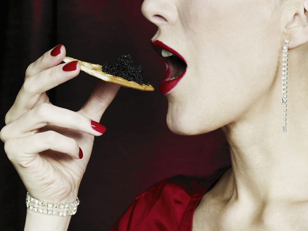 <p>Why not have your guests try eating their&nbsp;food in a daring way? 'Caviar bumps,' fashioned at Chicago's <a href="http://mapleandash.com/about-maple-ash/" target="_blank">Maple &amp; Ash</a>, may be the chicest way to eat with your hands. "Our favorite people are welcomed into the&nbsp;wine cellar for a surprise before dinner.&nbsp;We ask them to make a fist, and we drop a pearl spoonful of our favorite caviar onto their hand.&nbsp;This is the caviar bump.&nbsp;Your hand gently warms the caviar a bit to ensure the utmost deliciousness, and you lift the caviar to your mouth to&nbsp;enjoy.&nbsp;No utensils.&nbsp;And of course, we follow every caviar 'bump'&nbsp;with a champagne 'back,'" reveals&nbsp;Belinda Chang, Director of Wine and&nbsp;Service at the Windy City's sexiest steakhouse.&nbsp;</p>