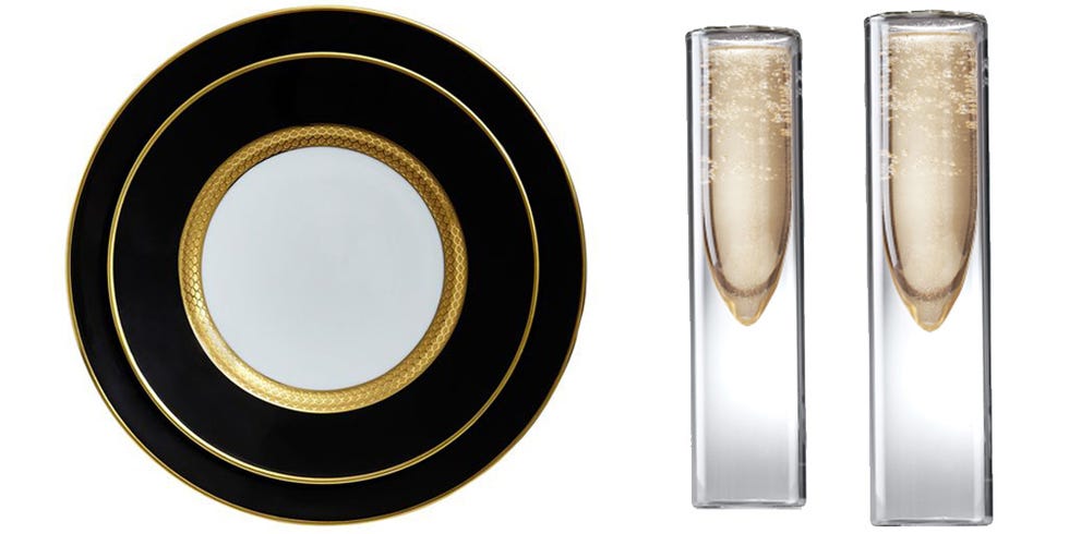 <p>When it comes to serving up your food, err towards the exotic, like pairing a&nbsp;modern take on&nbsp;champagne flutes with&nbsp;sultry dinnerware. Eating and drinking out of abnormal&nbsp;dishes will make the evening feel that much more interesting.&nbsp;</p><p><br></p><p><em data-redactor-tag="em" data-verified="redactor">Odyssͩe</em><span class="redactor-invisible-space" data-verified="redactor" data-redactor-tag="span" data-redactor-class="redactor-invisible-space"><em data-redactor-tag="em" data-verified="redactor"> dinner plate, $556, <a href="http://jungleeny.com/odysee-gold-w-black-dinner-plate.html" target="_blank">jungleeny.com</a>; Genus champagne flutes (set of 2), $40, <a href="https://www.touchofmodern.com/sales/genus-glassware/genus-champagne-flute-set-of-2?open=1" target="_blank">touchofmodern.com</a>.&nbsp;</em></span><br></p>
