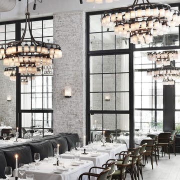Tablecloth, Room, Interior design, Glass, Furniture, Light fixture, Table, Ceiling fixture, Restaurant, Ceiling, 