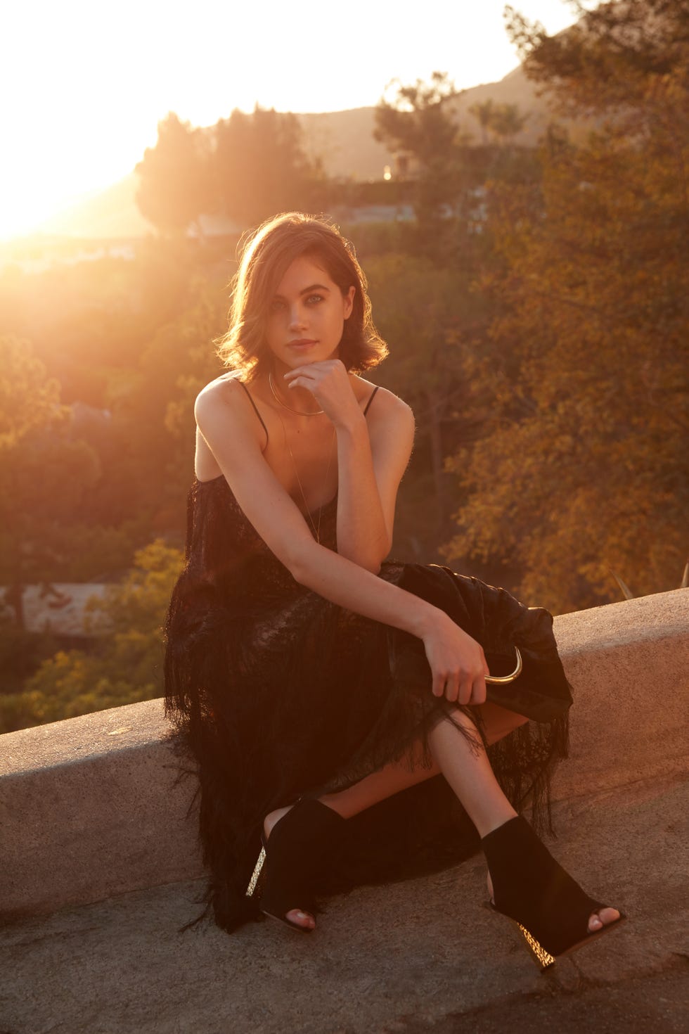 <p>The feathery, fringe-y drama on this tea-length dress is equal parts flapper, costume-drama, and gothic. Clearly made to be worn while sipping martinis,&nbsp;this look, paired&nbsp;with gold-heeled&nbsp;booties, will take you from drinks to dinner to an all-night A-list soiree on Mulholland Drive.
</p><p><br>
</p><p><em data-redactor-tag="em">BCBG&nbsp;Runway Loran Dress, $1198, <a href="http://www.bcbg.com/en/runway-loran-dress/EBM63J70-003.html?dwvar_EBM63J70-003_color=003#start=18" target="_blank">bcbg.com</a>; Zara Laminated High Heeled Leather Ankle Boots, $139, <a href="http://www.zara.com/us/en/woman/shoes/ankle-boots/laminated-high-heel-leather-ankle-boots-c288001p3836001.html" target="_blank">zara.com</a>; Stella McCartney Nina Velvet Fold-Over Shoulder Bag. $1595, <a href="http://www.neimanmarcus.com/Stella-McCartney-Nina-Velvet-Fold-Over-Shoulder-Bag-Navy/prod190480032/p.prod?icid=&amp;searchType=MAIN&amp;rte=%2Fsearch.jsp%3Ffrom%3DbrSearch%26request_type%3Dsearch%26search_type%3Dkeyword%26q%3Dstella+mccartney+handbags&amp;eItemId=prod190480032&amp;cmCat=search&amp;tc=91&amp;currentItemCount=90&amp;q=stella+mccartney+handbags&amp;searchURL=/search.jsp%3Ffrom%3DbrSearch%26start%3D0%26rows%3D120%26q%3Dstella+mccartney+handbags%26l%3Dstella+mccartney+handbags%26request_type%3Dsearch%26search_type%3Dkeyword" target="_blank">neimanmarcus.com</a>; H&amp;M Multistrand Necklace, $9.99, <a href="http://www.hm.com/us/product/84878?article=84878-A" target="_blank">hm.com</a></em><br></p>