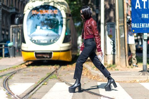 <p>Yoyo is one of my favorite bloggers to shoot. She is wearing another hero of the season, the Balenciaga platform&nbsp;boots, crossing the street as the tram approaches the 100s of photographers in Milan.<span class="redactor-invisible-space" data-verified="redactor" data-redactor-tag="span" data-redactor-class="redactor-invisible-space"></span></p>