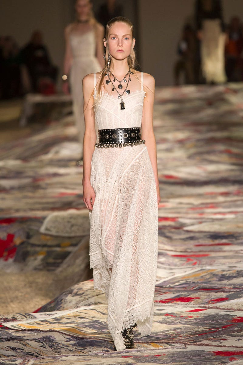 Dress, Shoulder, Fashion show, Textile, Jewellery, Style, Fashion model, Runway, Waist, Fashion accessory, 