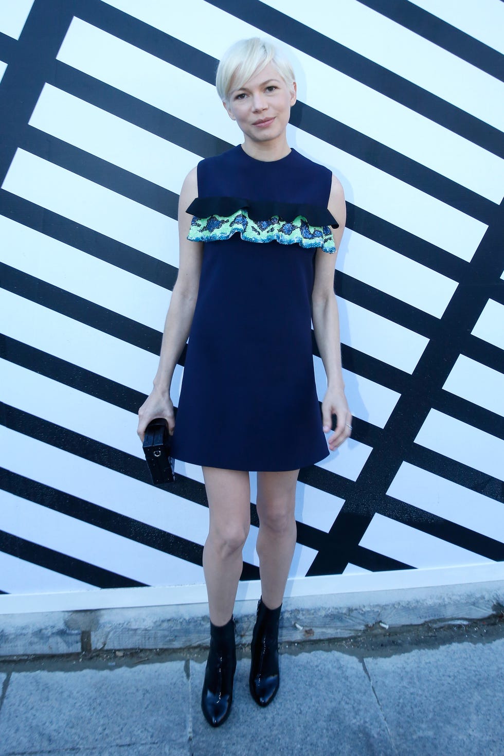 Clothing, Blue, Sleeve, Human leg, Shoulder, Dress, Joint, Standing, Style, Street fashion, 