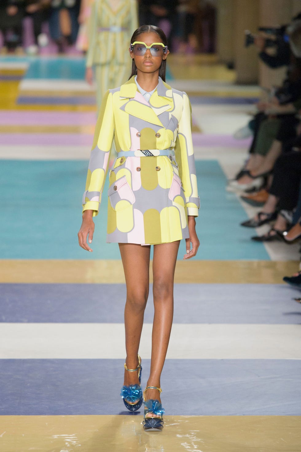 Yellow, Fashion show, Shoulder, Human leg, Joint, Outerwear, Runway, Style, Fashion model, Street fashion, 