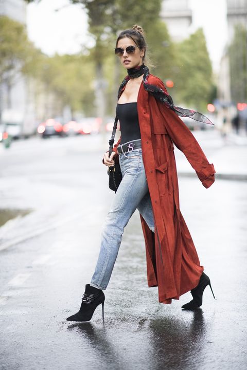 PARIS, FRANCE - SEPTEMBER 30:  Alessandra Ambrosio is wearing Trussardi suede brick red coat, Saint Laurent floral scarf, Giuseppe Zanotti  chain belt, Citizens of Humanity vintage denim, Chloe bag, Le Sila black boots, Linda Farrow sunglasses, Are You Am I black bodysuit seen in the streets of Paris on September 30, 2016 in Paris, France.  (Photo by Timur Emek/Getty Images)