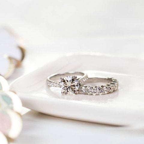 <p>"A mistake brides make when purchasing their wedding band is not considering how it will sit next to their engagement ring. Try them together to ensure they complement one another," advises Kiselstein. "The day of the wedding, a bride should wear her ring on her left hand if she prefers to and not feel forced to abide by tradition, as many brides will wear the engagement ring on their right hand until after the ceremony. If it doesn't fit on their right hand (the dominant hand is usually larger), they may ask a bridesmaid to hold the ring until after the ceremony. That way, the wedding band will go on first and they can stack the engagement ring up with it after."<span class="redactor-invisible-space" data-verified="redactor" data-redactor-tag="span" data-redactor-class="redactor-invisible-space"></span><br></p>