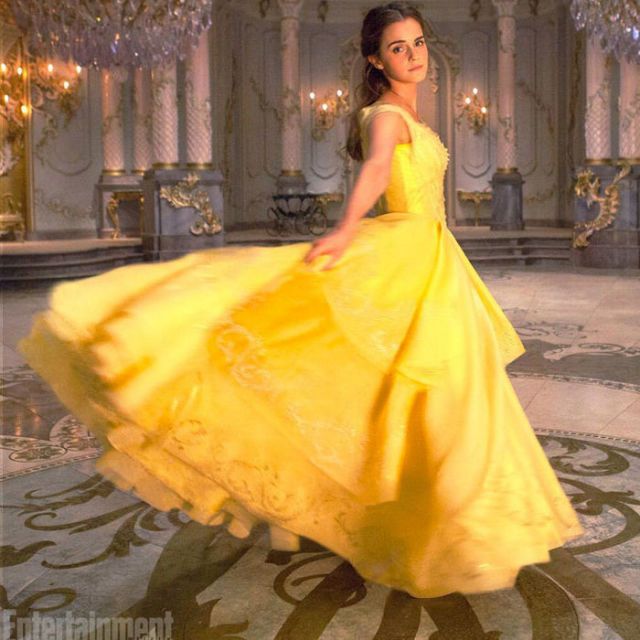 Yellow, Hairstyle, Dress, Formal wear, Style, Gown, Amber, Beauty, Fashion, Costume design, 
