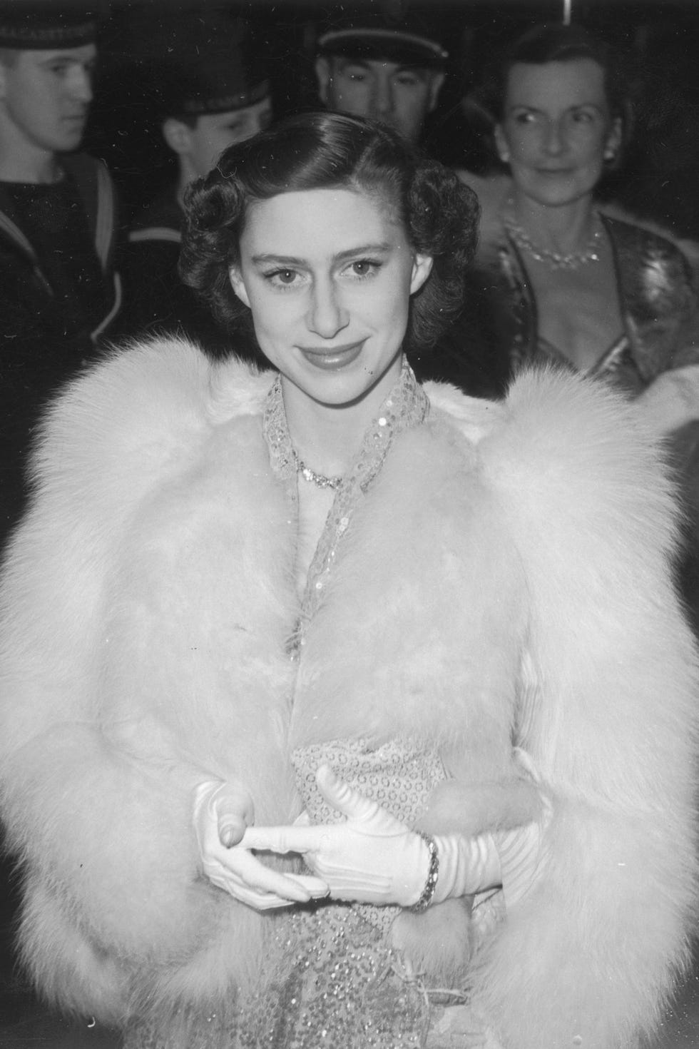 Fur, Fur clothing, Headpiece, Fashion, Smile, Textile, Headgear, Vintage clothing, Fun, Hair accessory, 