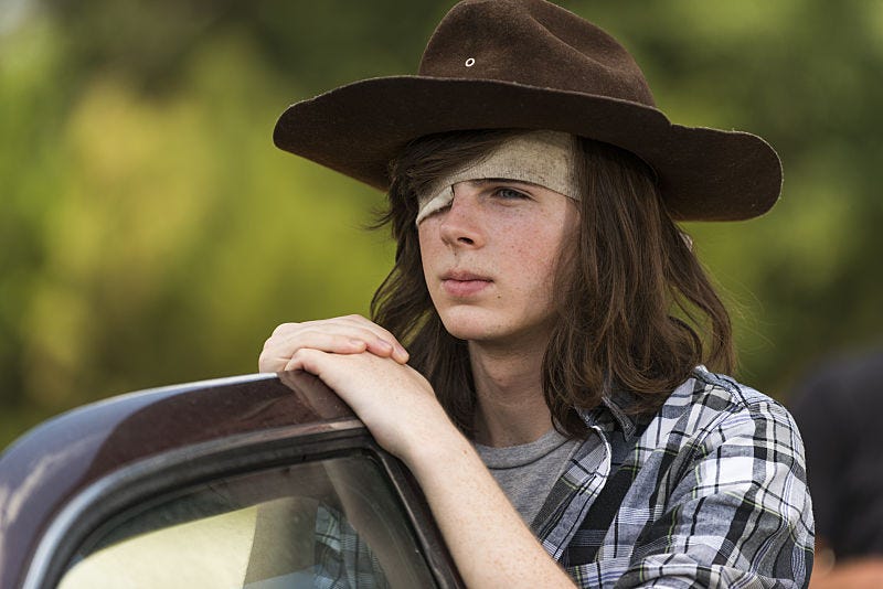 Chandler Riggs as Carl in The Walking Dead