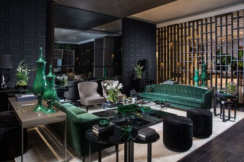 <p>Avant Design, made up of sisters Cristina and Monica Souza, created a space around Tom Ford that  epitomizes the designer's aesthetic with a rich emerald and black color palette. Added velvet pieces provide an element of luxe that is synonymous to Ford.</p>