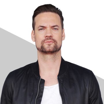 Ear, Facial hair, Cheek, Hairstyle, Forehead, Eyebrow, Collar, Jacket, Style, Beard, 