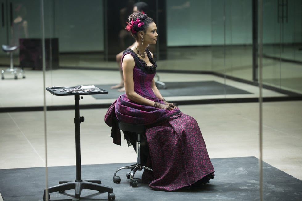 Purple, Sitting, Magenta, Artist, Headpiece, Performance art, Hair accessory, Stage, Fashion design, Scene, 