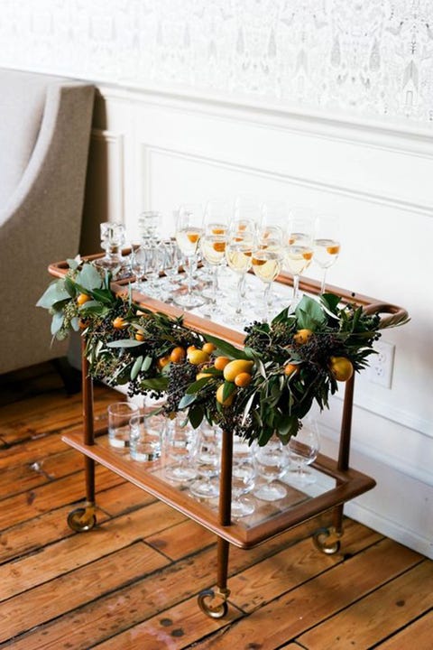 Making Spirits Bright <p>Your spirits will taste that much better getting shaken up atop a festive bar cart. </p> <p><em data-redactor-tag="em"><a href="http://www.munsterrose.com/blog/winter-in-season-feature-with-martha-stewart-weddings-part-1" target="_blank" data-tracking-id="recirc-text-link">Via Munster Rose</a></em></p>
